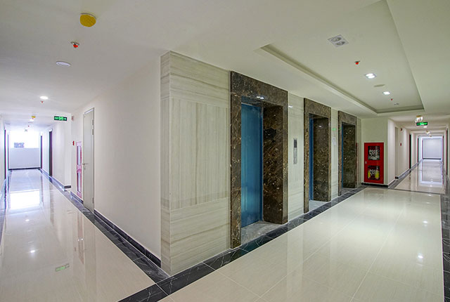 Hình ảnh hành lang căn hộ và hệ thống thang máy đã hoàn thiện